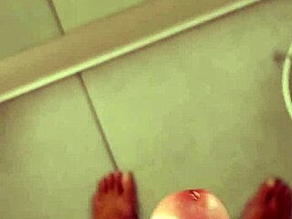 Tempting handjob strokes in the fitting room.