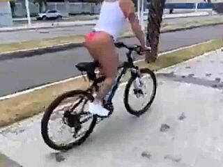 Wife's big ass takes anal plug while riding crossdressed cock doggystyle?