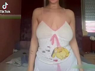 who wouldn't explode watching this busty brunette's huge natural tits bounce