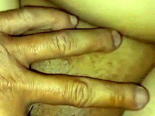 Indonesian bude bends over doggystyle complaining husband can't get hard