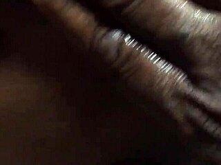 Nutz fists black whore's gaping big pussy till she squirts hard