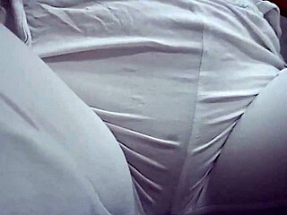 Close-Up View of Woman Urinating from Spread Pussy Lips in Detail