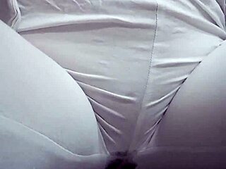 Close-Up View of Woman Urinating from Spread Pussy Lips in Detail