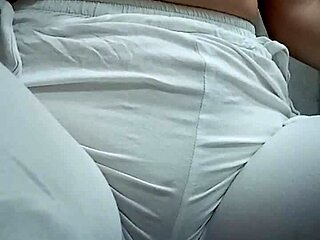 Close-Up View of Woman Urinating from Spread Pussy Lips in Detail