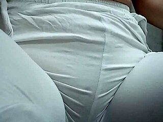 Close-Up View of Woman Urinating from Spread Pussy Lips in Detail