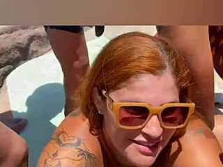 Porra garota, virou uma puta com esses caras na praia zuando paus monstros!