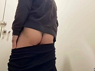 Muscular hunk strokes monster cock in public bathroom thrill