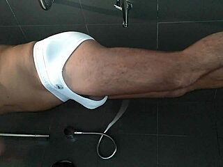 Shaved Body Enjoys Refreshing Shower Bath