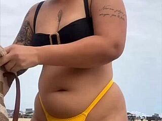 wanna see this yellow bikini splitting my swollen black pussy on the beach?