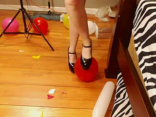 Fifi Foxx pops balloons while wearing high heels