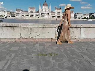 Arielarider struts Budapest in daring public transparent dress tease