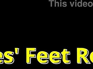 giggles' bare feet tickled sandy on beach close-up