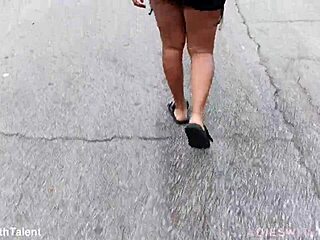 Pretty girl in sexy dress flashes outdoor teasing her curves