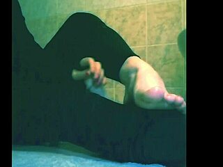 Shemale Veronica struts her blue-eyed crossdressing feet fetish after dark