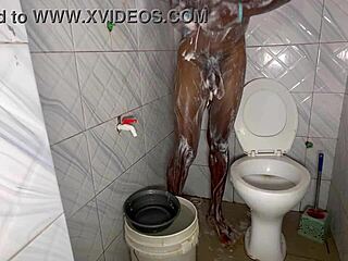 amateur dude strokes monster cock under shower spray in steamy bath