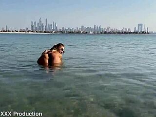 monika fox's big tits and shaved pussy flash free as she swims naked then struts tattooed body along california beach