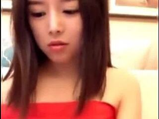 Beautiful chinese babe casually flashes her cute perky tits up close