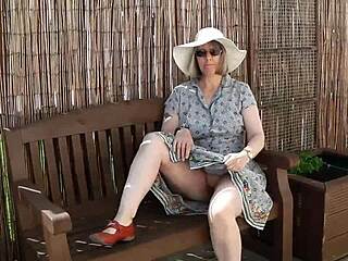 Naughty Housewife Strips Naked in Lush Outdoor Garden