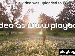 Petite Filipina Kit Rysha strips clothes outdoors posing nude in wildflower field skinny small tits