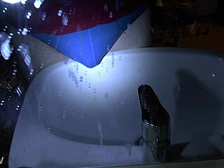 woman pees blue underpants directly over sink