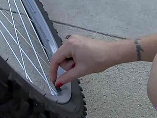 Damn inked blonde seduces cyclist for wet pussy licking and double dildo fun