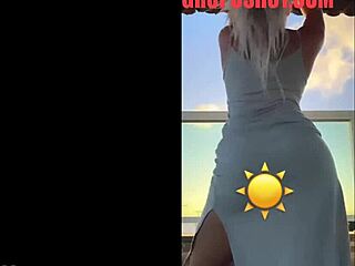 hot blonde dances in see-through dress teasing curves