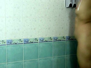 skinny thai schoolgirl secretly filmed showering her tight pussy and ass