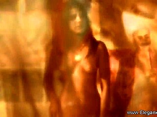 Stunning brunette milf teases in ripped clothes and sensual strip