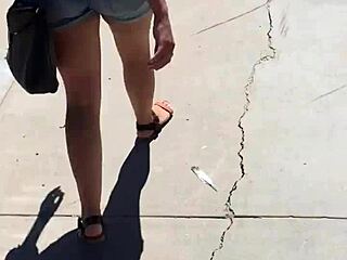 whoa check out this sexy babe's ass bouncing in tight booty shorts on street voyeur cam 🍑🔥😍