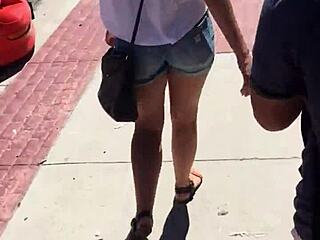 whoa check out this sexy babe's ass bouncing in tight booty shorts on street voyeur cam 🍑🔥😍