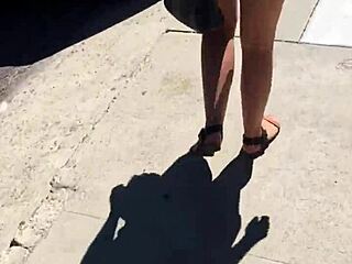 whoa check out this sexy babe's ass bouncing in tight booty shorts on street voyeur cam 🍑🔥😍