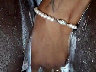 Black milf shaves wet pussy close-up before tattooed orgasm masturbation