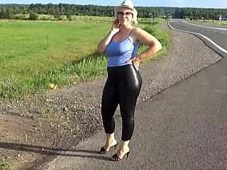 BIG BLONDE ASS STUFFED IN TIGHT LEATHER LEGGINGS CRAVING COCK!