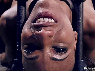 Flexible Ebony Slave Gags on Cock in Brutal Backbend Bondage!