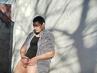 overwhelmed by lust stroking huge cock outdoors