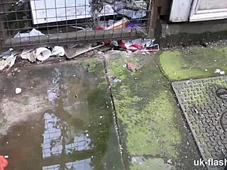 Cheeky British MILF flashes tiny tits and pussy to builders outdoors