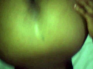 Wet black African ass shakes and glistens in raw close-up display