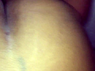 Wet black African ass shakes and glistens in raw close-up display