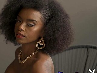 skinny ebony teen muse naadia strips slutty dress baring huge boobs