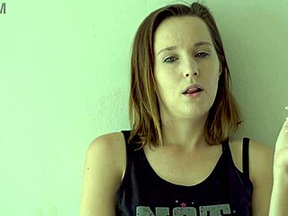 hot brunette lights up smokes and teases her curves slow