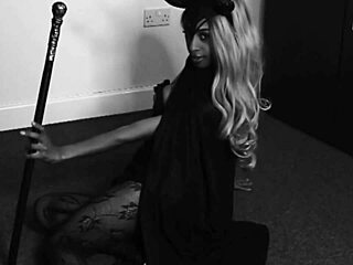 hey, wanna watch this horny ebony witch fuck her petite ass with a halloween cane?