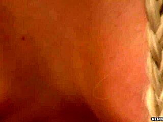 bound oiled blonde's pussy throbs from vibrator torment in bdsm setup