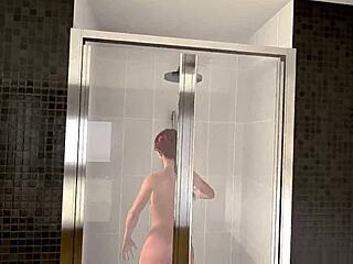 Redhead babe teases in steamy shower reality game trailer