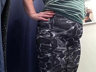 whoa this big ass milf in white panties tries tight leggings in fitting room voyeur style 👀🍑