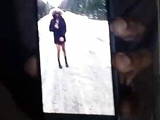 ebony beauty teases curves in snowy outdoor chill