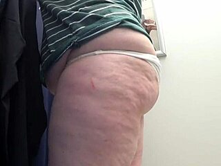 whoa this big ass milf in white panties tries tight leggings in fitting room voyeur style 👀🍑