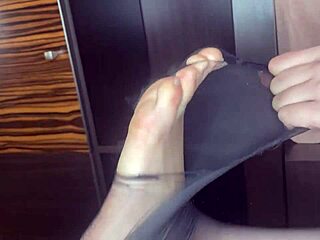 Classy Amateur In Black Stockings Gives Closeup Footjob To Anal Toy On Bed!