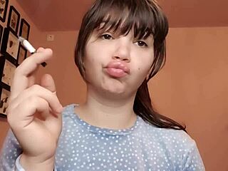 Watch these big glossy latina lips smoke seductively in extreme close-up