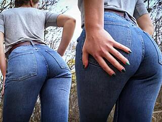 sexy milf in tight blue jeans bends over teasing huge ass outdoors during erotic massage