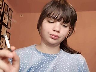 Watch these big glossy latina lips smoke seductively in extreme close-up